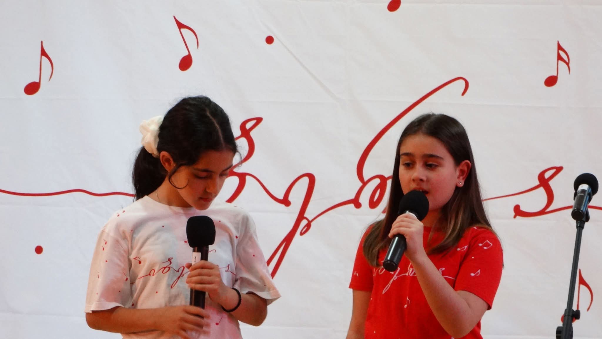 Singers of the Iberia ensemble at the microphones